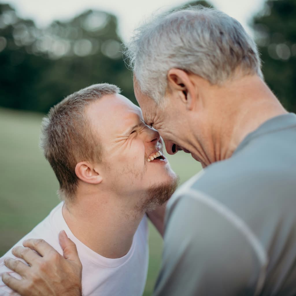 A man and a child enjoying a shared moment